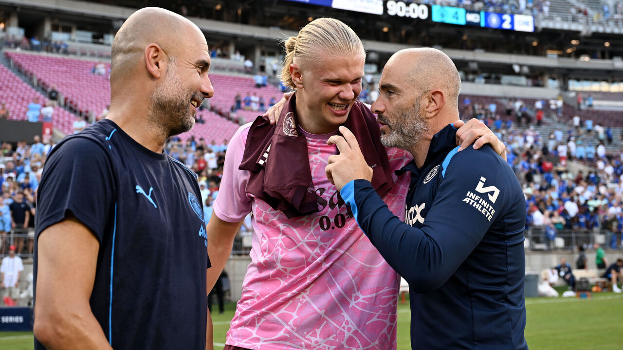 COLUMBUS, OHIO - AUGUST 03: Enzo Maresca, Manager of Chelsea talks to Pep Guardiola, Manager of Manchester City and Erling Haaland of Manchester City after the Pre-Season Friendly match between Chelsea FC and Manchester City at Ohio Stadium on August 03, 2024 in Columbus, Ohio.