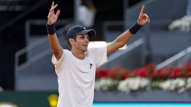 MADRID, SPAIN - APRIL 22: Rafa Jodar of Spain celebrates the victory with a with a dedication to Jude Bellingham presents on the stands at the end of the match against Jesper de Jong of Netherlands during the Mutua Madrid Open 2026 tournament celebrated at La Caja Magica on April 22, 2026 in Madrid, Spain.