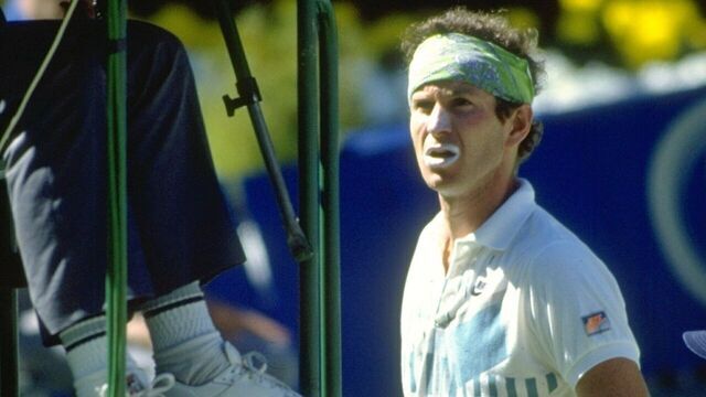 Jan 1990: John McEnroe of the USA speaks to the umpire during the Australian Open at Flinders Park in Melbourne, Australia. \ Mandatory Credit: Pascal Rondeau/Allsport