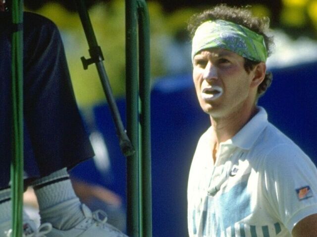 Jan 1990: John McEnroe of the USA speaks to the umpire during the Australian Open at Flinders Park in Melbourne, Australia. \ Mandatory Credit: Pascal Rondeau/Allsport