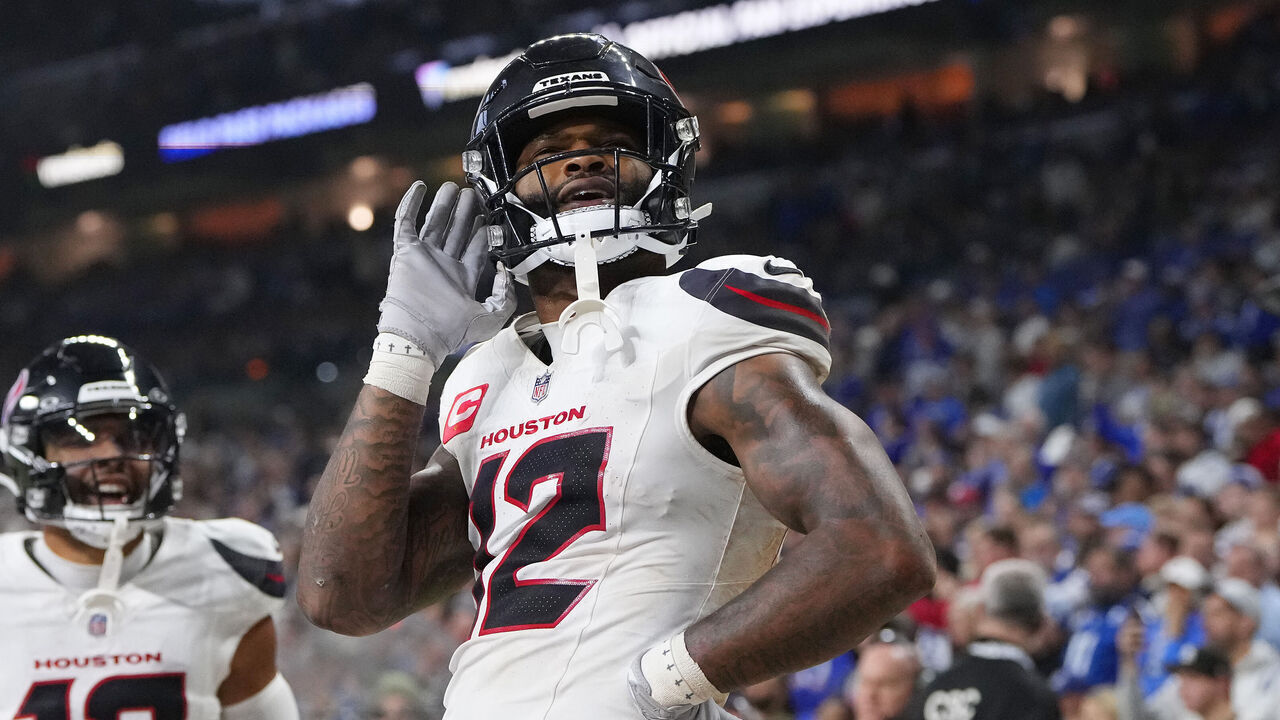 INDIANAPOLIS, INDIANA - NOVEMBER 30: Nico Collins #12 of the Houston Texans celebrates after his rushing touchdown against the Indianapolis Colts during the fourth quarter at Lucas Oil Stadium on November 30, 2025 in Indianapolis, Indiana.