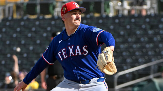 MESA, ARIZONA - FEBRUARY 26, 2026: Peyton Gray #75 of the Texas Rangers throws a pitch during the seventh inning of a spring training game against the Athletics at Hohokam Stadium on February 26, 2026 in Mesa, Arizona.
