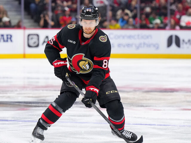 OTTAWA, CANADA - APRIL 5: Jake Sanderson #85 of the Ottawa Senators skates against the Carolina Hurricanes on April 5, 2026 at Canadian Tire Centre in Ottawa, Ontario, Canada.