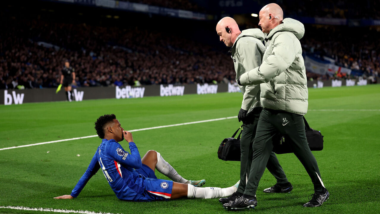 LONDON, ENGLAND - APRIL 18: Estevao of Chelsea reacts with an injury during the Premier League match between Chelsea and Manchester United at Stamford Bridge on April 18, 2026 in London, England.