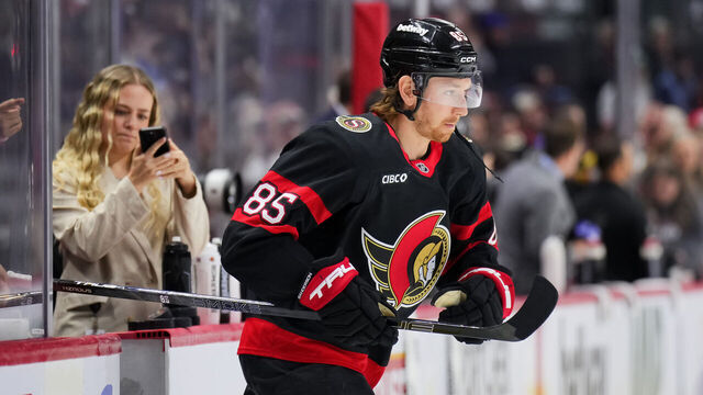OTTAWA, CANADA - APRIL 05: Jake Sanderson #85 of the Ottawa Senators steps onto the ice for warmups prior to a game against the Carolina Hurricanes at Canadian Tire Centre on April 05, 2026 in Ottawa, Ontario, Canada.
