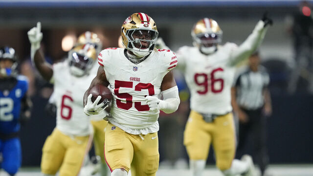 INDIANAPOLIS, INDIANA - DECEMBER 22: Dee Winters #53 of the San Francisco 49ers intercepts the pass for a touchdown during the fourth quarter of the game against the Indianapolis Colts at Lucas Oil Stadium on December 22, 2025 in Indianapolis, Indiana.