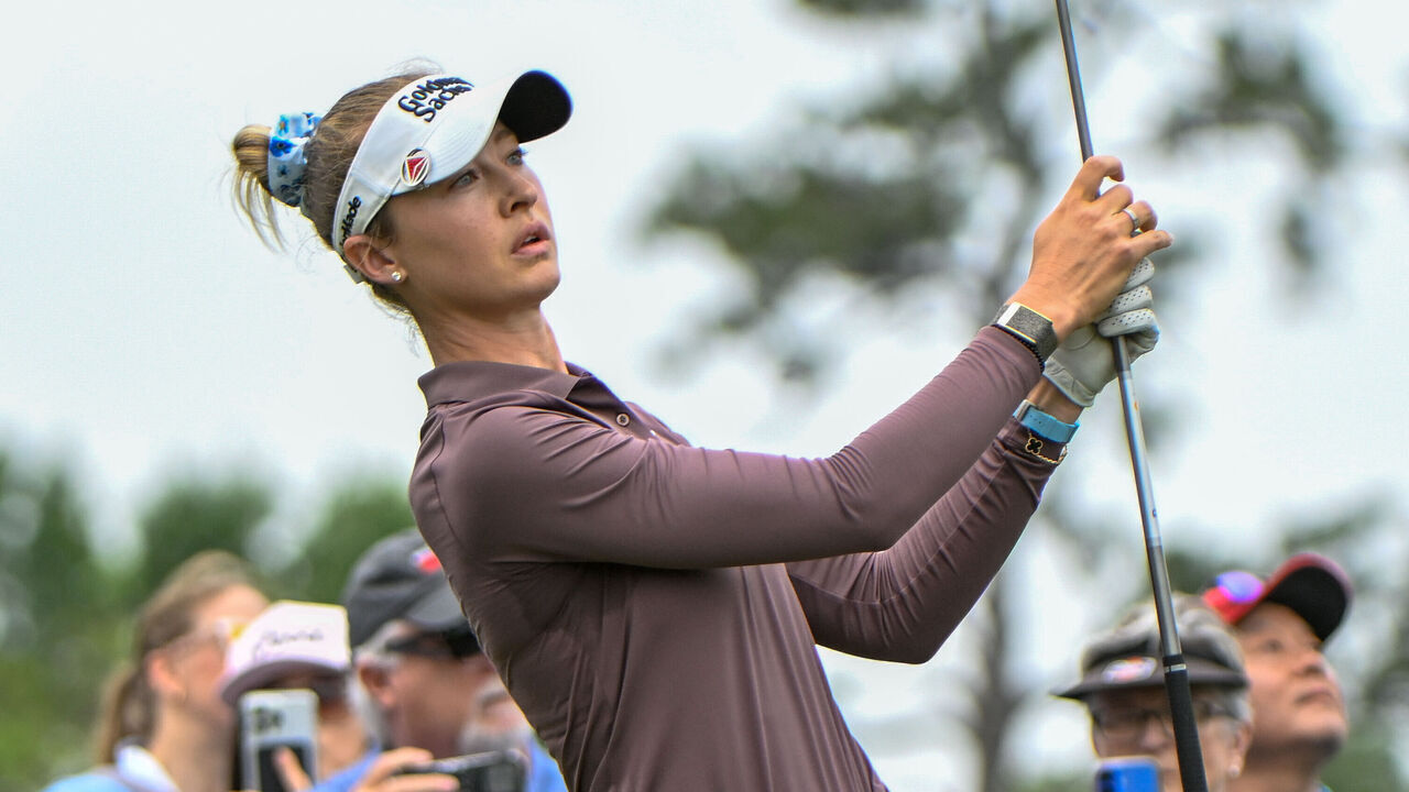 HOUSTON, TX - APRIL 24: Nelly Korda (USA) twirls her club at the end of her tee shot on 9 during the second round of The Chevron Championship on April 24, 2026, at Memorial Park Golf Course in Houston, Texas.