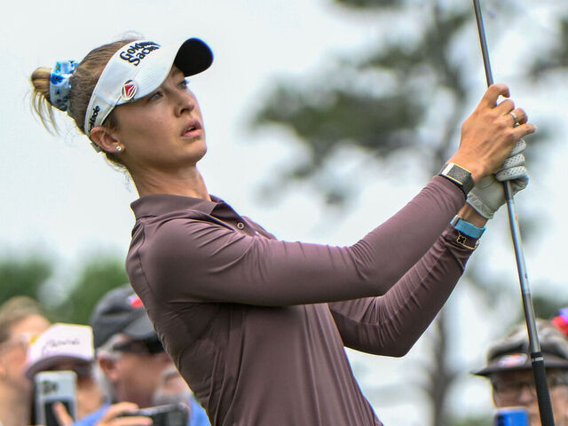 HOUSTON, TX - APRIL 24: Nelly Korda (USA) twirls her club at the end of her tee shot on 9 during the second round of The Chevron Championship on April 24, 2026, at Memorial Park Golf Course in Houston, Texas.