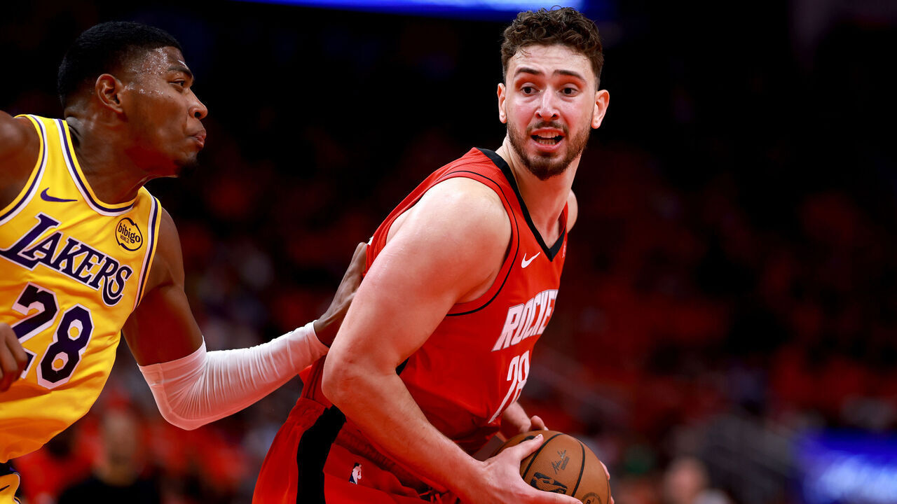 HOUSTON, TEXAS - APRIL 24: Alperen Sengun #28 of the Houston Rockets backs down Rui Hachimura #28 of the Los Angeles Lakers during the first quarter of the game at Toyota Center on April 24, 2026 in Houston, Texas.