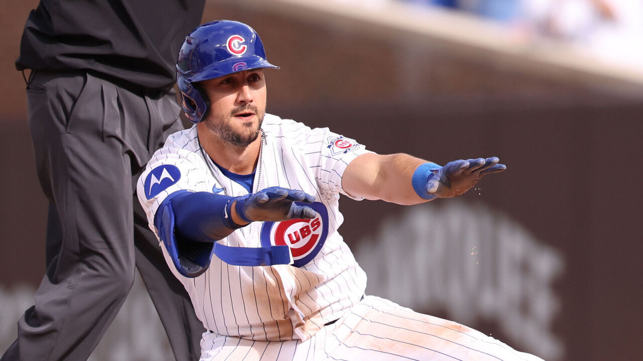 CHICAGO, ILLINOIS - APRIL 12: Michael Conforto #20 of the Chicago Cubs celebrates hitting a double during the ninth inning against the Pittsburgh Pirates at Wrigley Field on April 12, 2026 in Chicago, Illinois.