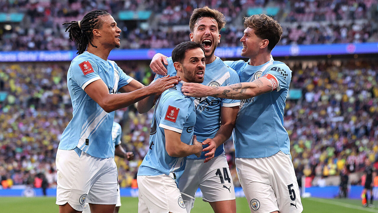 LONDON, ENGLAND - APRIL 25: Nico Gonzalez of Manchester City celebrates scoring his team's second goal with teammates Nathan Ake, Bernardo Silva and John Stones during the Emirates FA Cup Semi Final match between Manchester City and Southampton at Wembley Stadium on April 25, 2026 in London, England.