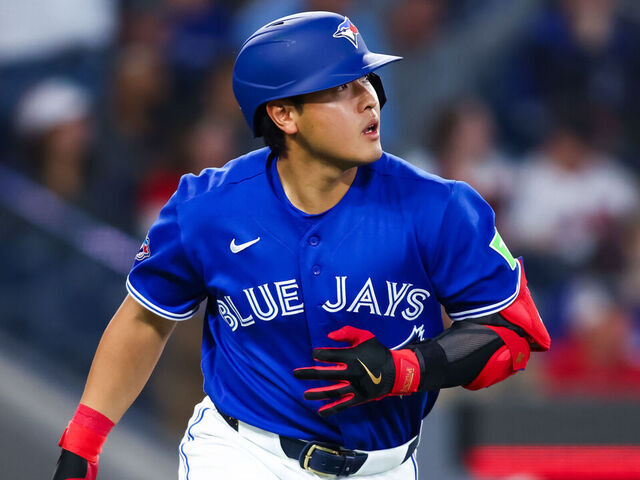 TORONTO, CANADA - APRIL 25: Kazuma Okamoto #7 of the Toronto Blue Jays drops the bat as he watches his solo-home run ball in the fourth inning of their MLB game against the Cleveland Guardians at Rogers Centre on April 25, 2026 in Toronto, Ontario, Canada.