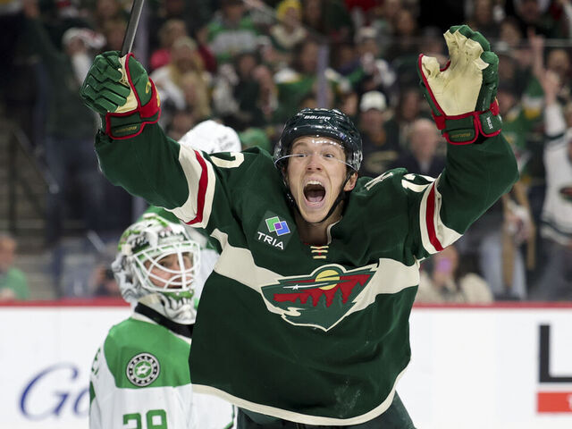 ST PAUL, MINNESOTA - APRIL 25: Matt Boldy #12 of the Minnesota Wild celebrates after scoring the game-winning goal while Jake Oettinger #29 of the Dallas Stars looks on during overtime of Game Four of the First Round of the 2026 Stanley Cup Playoffs at Grand Casino Arena on April 25, 2026 in St Paul, Minnesota.