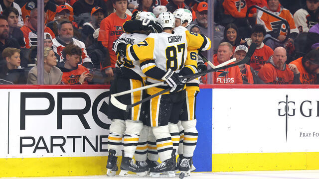 PHILADELPHIA, PENNSYLVANIA - APRIL 25: Kris Letang #58 of the Pittsburgh Penguins celebrates with Sidney Crosby #87 and Rickard Rakell #67 after scoring a goal on Dan Vladar (not pictured) #80 of the Philadelphia Flyers during the third period in Game Four of the First Round of the 2026 Stanley Cup Playoffs at Xfinity Mobile Arena on April 25, 2026 in Philadelphia, Pennsylvania.