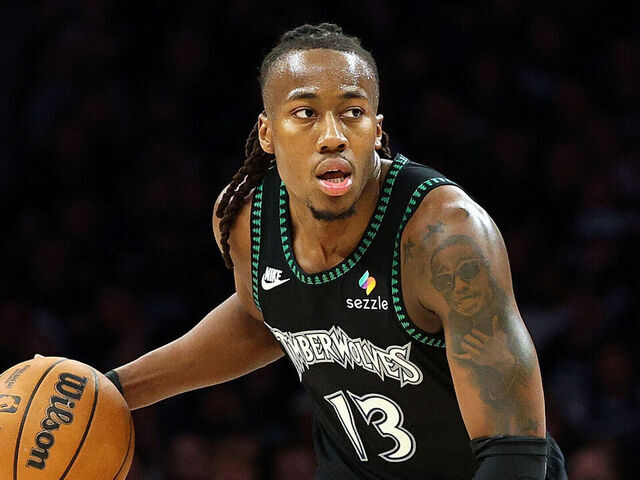 MINNEAPOLIS, MINNESOTA - APRIL 23: Ayo Dosunmu #13 of the Minnesota Timberwolves dribbles the ball against the Denver Nuggets in the fourth quarter of Game Three of the First Round of the 2026 NBA Western Conference Playoffs at Target Center on April 23, 2026 in Minneapolis, Minnesota. The Timberwolves defeated the Nuggets 113-96.