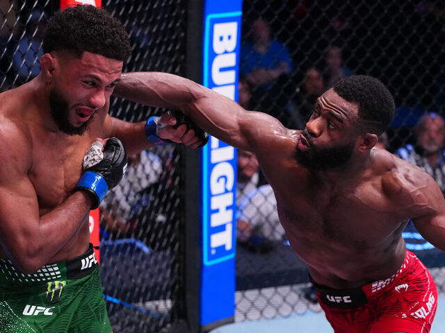 LAS VEGAS, NEVADA - APRIL 25: (R-L) Aljamain Sterling punches Youssef Zalal of Morocco in a featherweight fight during the UFC Fight Night event at Meta APEX on April 25, 2026 in Las Vegas, Nevada.