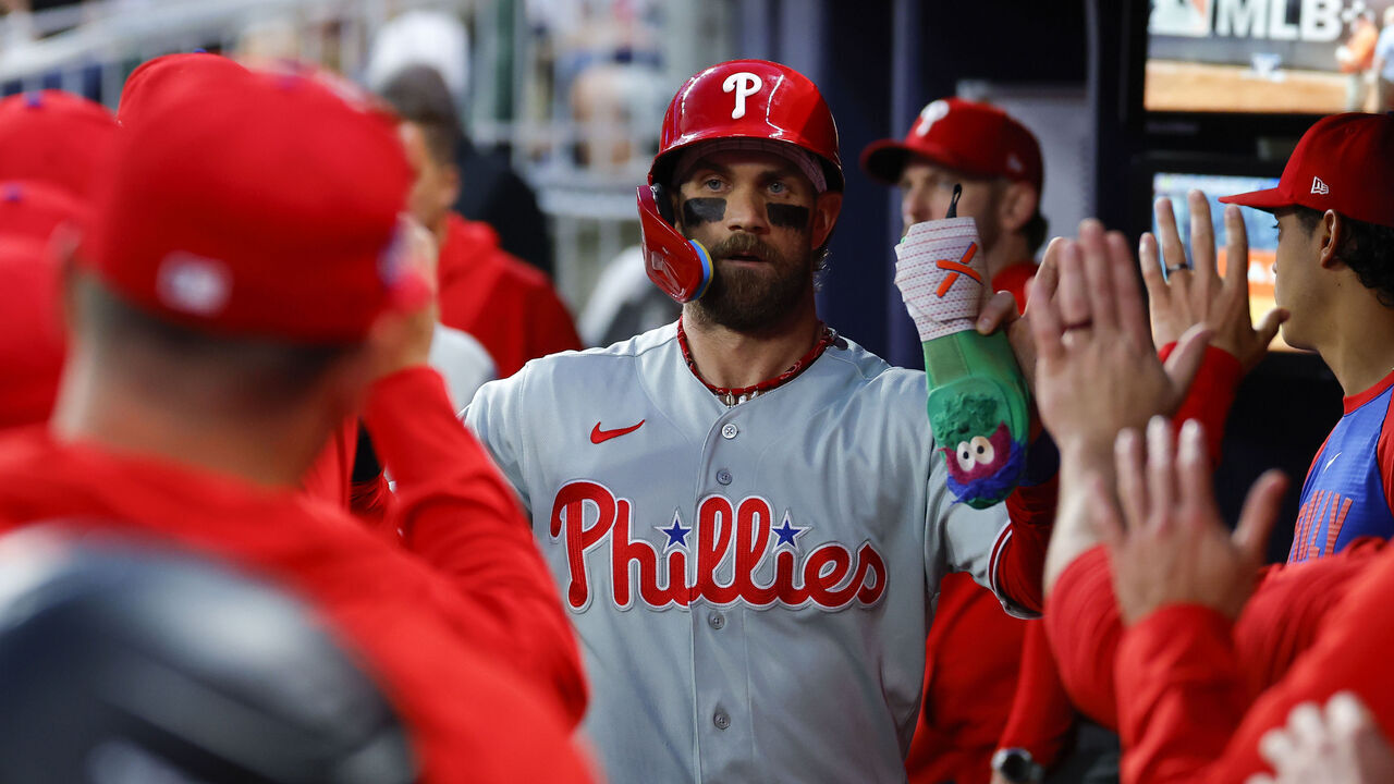 ATLANTA, GEORGIA - APRIL 25: Bryce Harper #3 of the Philadelphia Phillies reacts after scoring during the first inning against the Atlanta Braves at Truist Park on April 25, 2026 in Atlanta, Georgia.