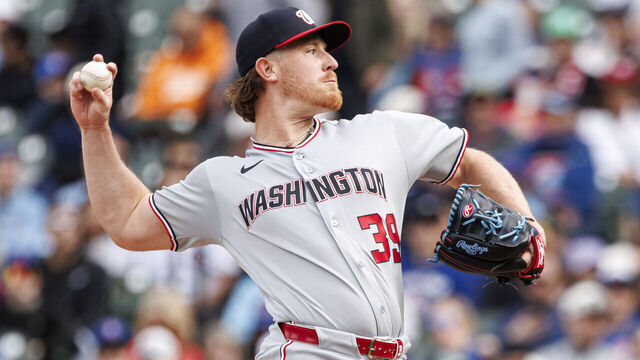 CHICAGO, ILLINOIS - MARCH 29: Clayton Beeter #39 of the Washington Nationals delivers a pitch in the ninth inning of a game between the Washington Nationals and the Chicago Cubs at Wrigley Field on March 29, 2026 in Chicago, Illinois.