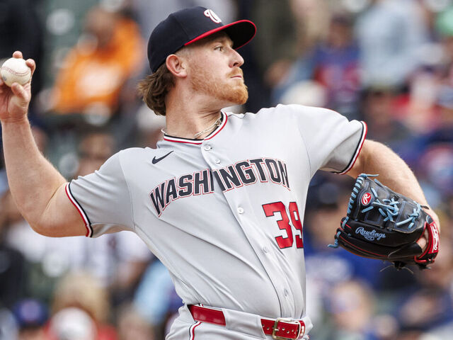 CHICAGO, ILLINOIS - MARCH 29: Clayton Beeter #39 of the Washington Nationals delivers a pitch in the ninth inning of a game between the Washington Nationals and the Chicago Cubs at Wrigley Field on March 29, 2026 in Chicago, Illinois.