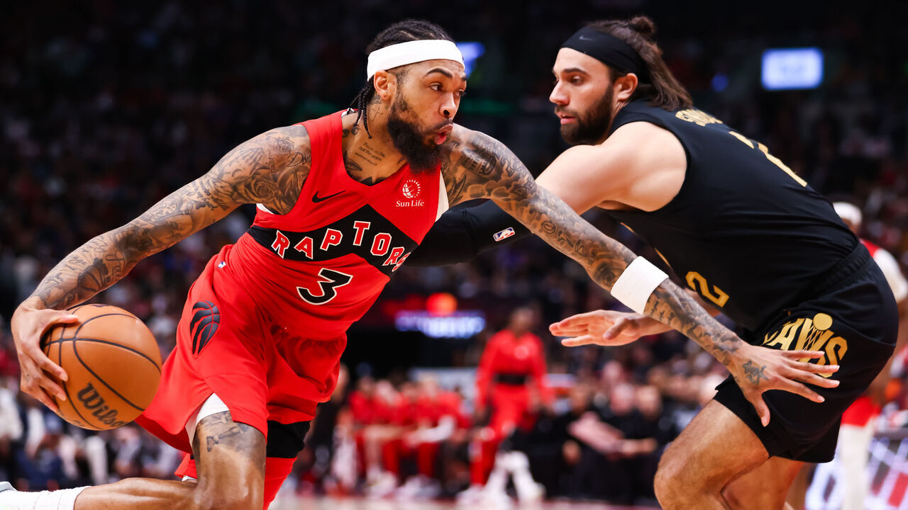 TORONTO, CANADA - APRIL 26: Brandon Ingram #3 of the Toronto Raptors drives to the net against Max Strus #2 of the Cleveland Cavaliers during first half of Game Four of the Eastern Conference First Round NBA Playoffs at Scotiabank Arena on April 26, 2026 in Toronto, Ontario, Canada.