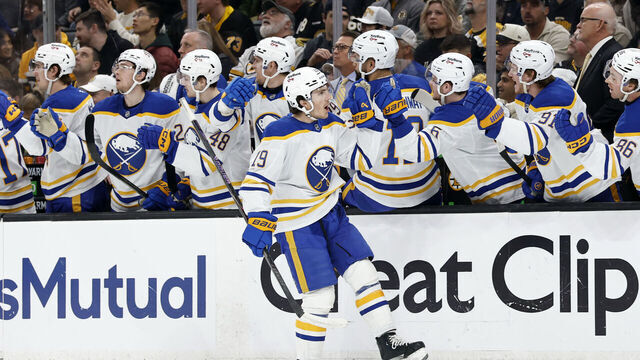 BOSTON, MA - APRIL 26: Peyton Krebs #19 of the Buffalo Sabres skates by the bench after opening the scoring during game 4 of the Stanley Cup Playoffs First Round between the Boston Bruins and the Buffalo Sabres on April 26, 2026, at TD Garden in Boston, Massachusetts.