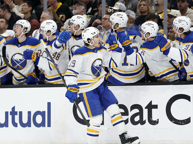 BOSTON, MA - APRIL 26: Peyton Krebs #19 of the Buffalo Sabres skates by the bench after opening the scoring during game 4 of the Stanley Cup Playoffs First Round between the Boston Bruins and the Buffalo Sabres on April 26, 2026, at TD Garden in Boston, Massachusetts.
