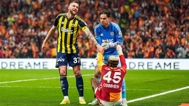 Victor Osimhen of Galatasaray A.S. competes with Milan Skriniar and Ederson Moraes of Fenerbahce during the Trendyol Super League match between Galatasaray and Fenerbahce at Rams Park on April 26, 2026, in Istanbul, Turkey.