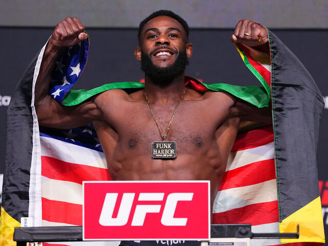 LAS VEGAS, NEVADA - APRIL 24: Aljamain Sterling poses on the scale during the UFC weigh-in at Meta APEX on April 24, 2026 in Las Vegas, Nevada.