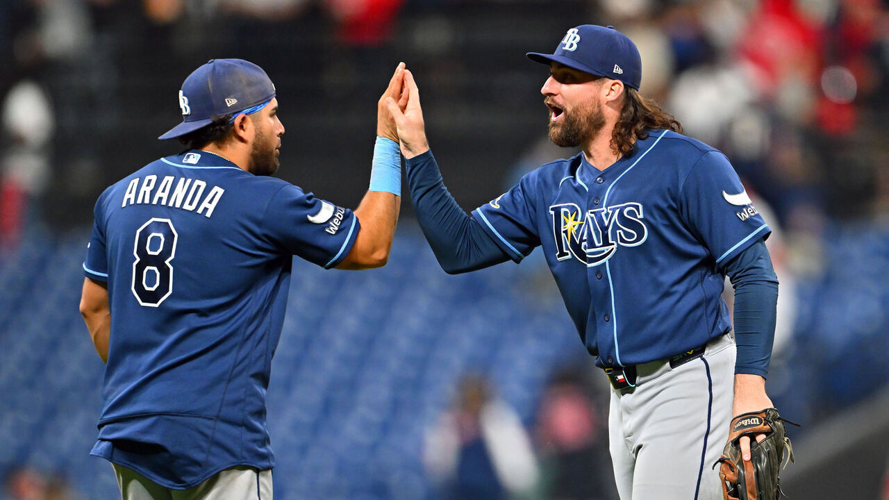 CLEVELAND, OHIO - APRIL 27: Jonathan Aranda #8 and Ryan Vilade #26 of the Tampa Bay Rays celebrate after the Rays defeated the Cleveland Guardians at Progressive Field on April 27, 2026 in Cleveland, Ohio. The Rays defeated the Guardians 3-2.