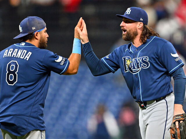 CLEVELAND, OHIO - APRIL 27: Jonathan Aranda #8 and Ryan Vilade #26 of the Tampa Bay Rays celebrate after the Rays defeated the Cleveland Guardians at Progressive Field on April 27, 2026 in Cleveland, Ohio. The Rays defeated the Guardians 3-2.