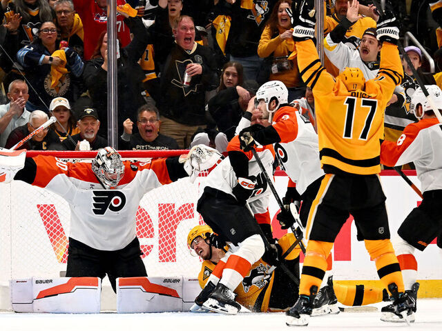 PITTSBURGH, PA - APRIL 27: Bryan Rust #17 of the Pittsburgh Penguins celebrates a goal by Kris Letang #58 (not pictured) against Dan Vladar #80 of the Philadelphia Flyers in Game Five of the First Round of the 2026 Stanley Cup Playoffs at PPG PAINTS Arena on April 27, 2026 in Pittsburgh, Pennsylvania.