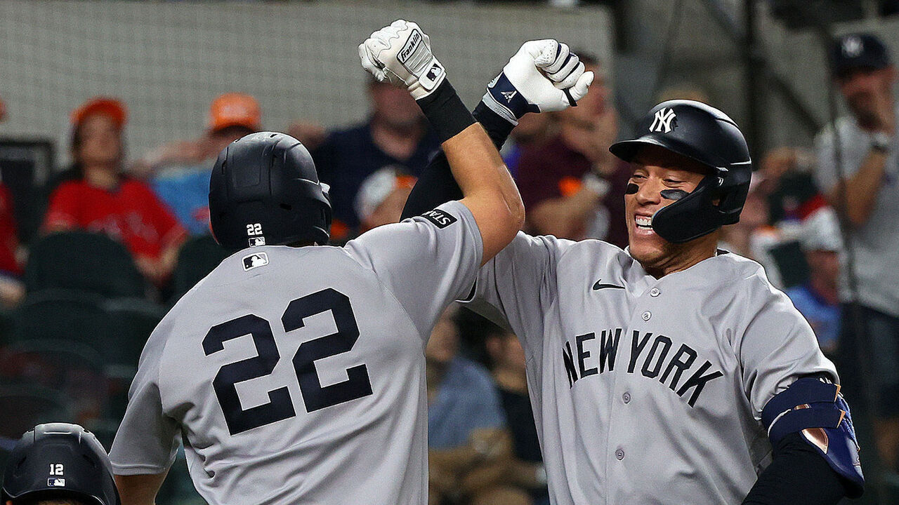 ARLINGTON, TEXAS - APRIL 27: Ben Rice #22 of the New York Yankees celebrates with Aaron Judge #99 of the New York Yankees after Rice's two-run home run in the second inning against the Texas Rangers at Globe Life Field on April 27, 2026 in Arlington, Texas.