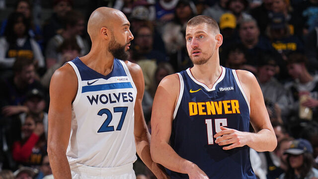 DEMVER, CO - APRIL 27: Rudy Gobert #27 of the Minnesota Timberwolves and Nikola Jokic #15 of the Denver Nuggets look on during the game during Round One Game Five of the 2026 NBA Playoffs on April 27, 2026 at Ball Arena in Denver, Colorado. Mandatory Copyright Notice: Copyright 2026 NBAE
