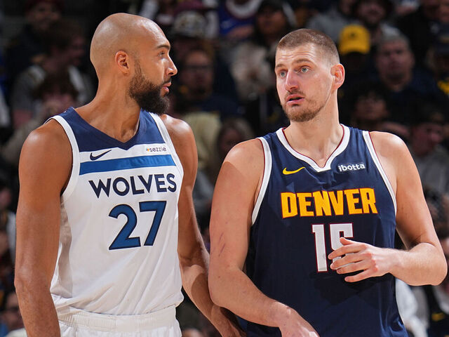 DEMVER, CO - APRIL 27: Rudy Gobert #27 of the Minnesota Timberwolves and Nikola Jokic #15 of the Denver Nuggets look on during the game during Round One Game Five of the 2026 NBA Playoffs on April 27, 2026 at Ball Arena in Denver, Colorado. Mandatory Copyright Notice: Copyright 2026 NBAE