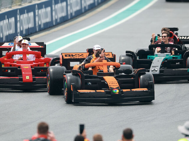 MIAMI, FLORIDA - MAY 04: Lando Norris of Great Britain and McLaren Oscar Piastri of Australia and McLaren Charles Leclerc of Monaco and Scuderia Ferrari Lewis Hamilton of Great Britain and Scuderia Ferrari George Russell of Great Britain and Mercedes AMG Petronas F1 Team and Andrea Kimi Antonelli of Italy and Mercedes AMG Petronas F1 Team at the Lego drivers parade prior to the F1 Grand Prix of Miami at Miami International Autodrome on May 04, 2025 in Miami, Florida.
