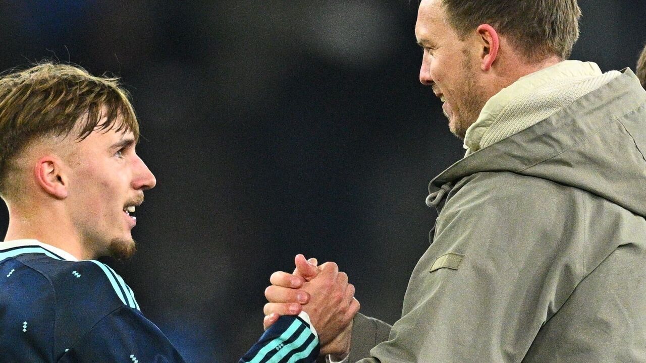 27 March 2026, Switzerland, Basel: Soccer, men, international matches, Switzerland - Germany, St. Jakob-Park, national coach Julian Nagelsmann (Germany) talks to Lennart Karl (Germany) after the final whistle. Photo: Tom Weller/dpa - IMPORTANT NOTE: In accordance with the regulations of the DFL German Football League and the DFB German Football Association, it is prohibited to utilize or have utilized photographs taken in the stadium and/or of the match in the form of sequential images and/or video-like photo series.