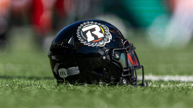 REGINA, CANADA - SEPTEMBER 28: A view of an Ottawa Redblacks helmet displaying a specially designed logo for Truth and Reconciliation day for the game between the Ottawa Redblacks and Saskatchewan Roughriders at Mosaic Stadium on September 28, 2024 in Regina, Canada.