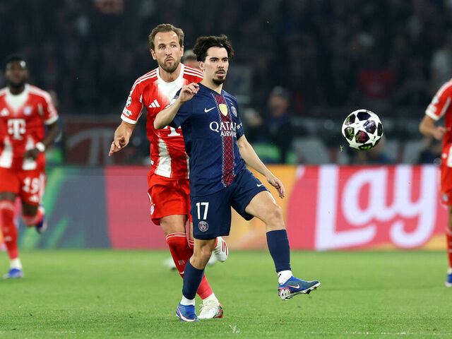 PARIS, FRANCE - APRIL 28: Vitinha of Paris Saint-Germain is challenged by Harry Kane of FC Bayern Munich during the UEFA Champions League 2025/26 Semi Final First Leg match between Paris Saint-Germain and FC Bayern München at Parc des Princes on April 28, 2026 in Paris, France.