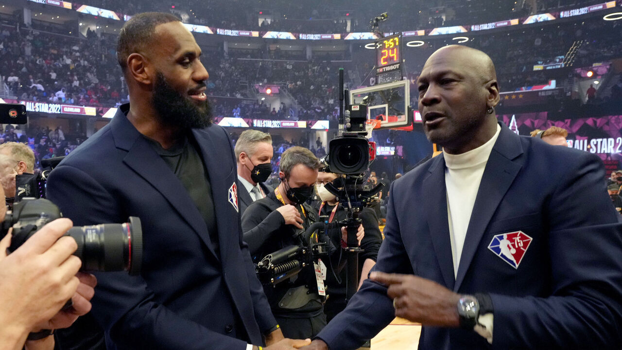 CLEVELAND, OHIO - FEBRUARY 20: (L-R) LeBron James and Michael Jordan attend the 2022 NBA All-Star Game at Rocket Mortgage Fieldhouse on February 20, 2022 in Cleveland, Ohio.