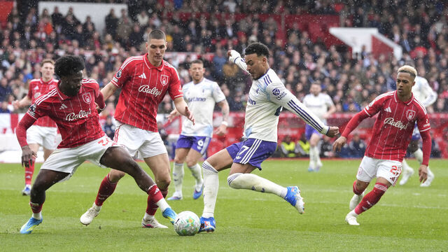 Aston Villa's Morgan Rogers (centre) in action during the Premier League match at City Ground, Nottingham. Picture date: Sunday April 12, 2026.