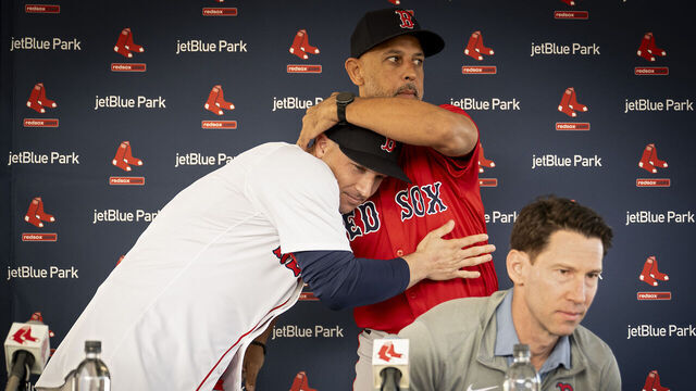 FORT MYERS, FLORIDA - FEBRUARY 16: Alex Bregman #2 of the Boston Red Sox reacts with manager Alex Cora #13 of the Boston Red Sox during his introductory press conference at JetBlue Park at Fenway South in Fort Myers, Florida on February 16, 2025.