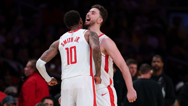 LOS ANGELES, CA - APRIL 29: Houston Rockets center Alperen Sengun (28) and forward Jabari Smith Jr. (10) celebrate during the fourth quarter of game five of a Western Conference NBA playoff game against the Los Angeles Lakers at Crypto.com Arena on Wednesday, April 29, 2026 in Los Angeles, CA. (Robert Gauthier / Los Angeles Times via Getty Images)