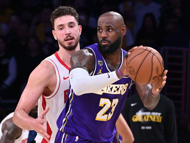 LOS ANGELES, CA - APRIL 29: LeBron James #23 of the Los Angeles Lakers looks to pass the ball while defended by Alperen Sengun #28 of the Houston Rockets during the game during Round One Game Five on April 29, 2026 at Crypto.Com Arena in Los Angeles, California. NOTE TO USER: User expressly acknowledges and agrees that, by downloading and/or using this Photograph, user is consenting to the terms and conditions of the Getty Images License Agreement. Mandatory Copyright Notice: Copyright 2026 NBAE