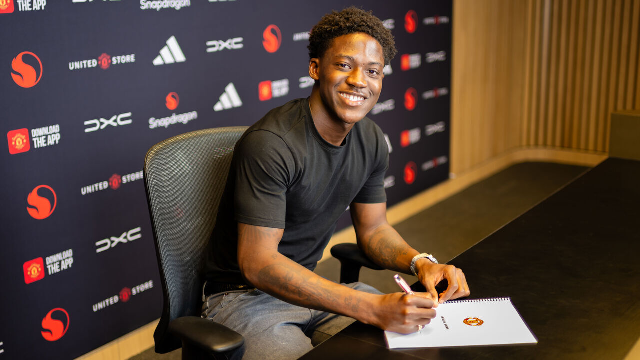 MANCHESTER, ENGLAND - APRIL 30: (EXCLUSIVE COVERAGE) Kobbie Mainoo of Manchester United poses after signing a new contract at the club at Carrington Training Ground on April 30, 2026 in Manchester, England.