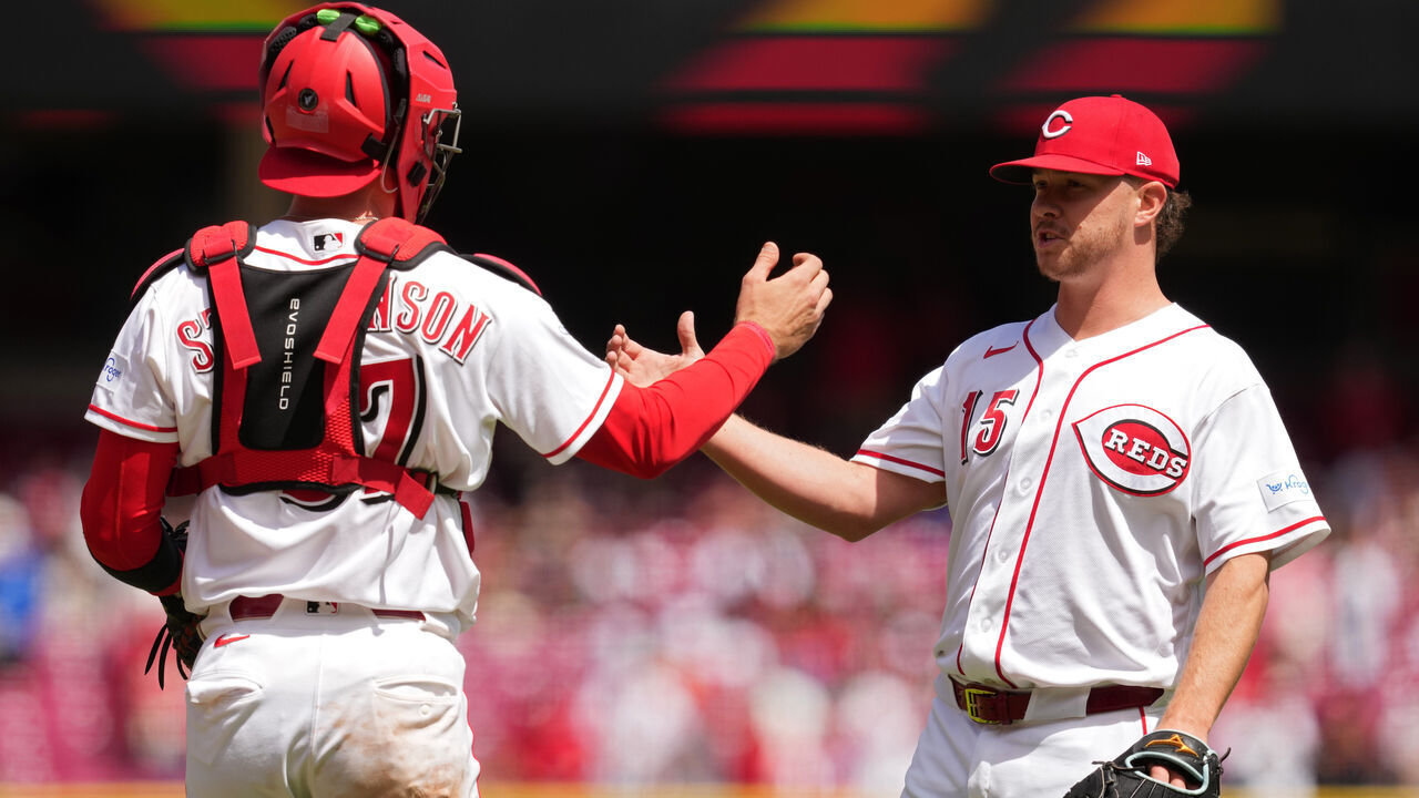 CINCINNATI, OHIO - APRIL 30: Emilio Pagán #15 of the Cincinnati Reds celebrates with Tyler Stephenson #37 following a baseball game against the Colorado Rockies at Great American Ball Park on April 30, 2026 in Cincinnati, Ohio.
