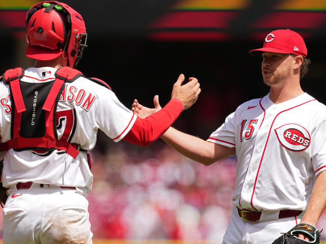 CINCINNATI, OHIO - APRIL 30: Emilio Pagán #15 of the Cincinnati Reds celebrates with Tyler Stephenson #37 following a baseball game against the Colorado Rockies at Great American Ball Park on April 30, 2026 in Cincinnati, Ohio.