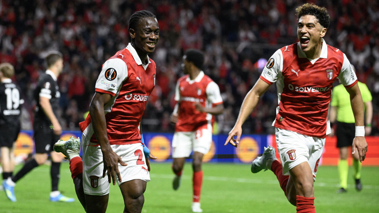 Sporting Braga's Ivorian midfielder #20 Mario Dorgeles (L) celebrates scoring his team's second goal during the UEFA Europa League semi final first leg football match between SC Braga and SC Freiburg at Municipal stadium of Braga on April 30, 2026.