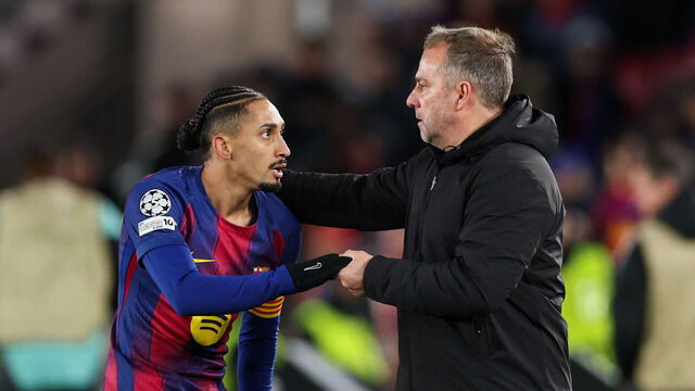 BARCELONA, SPAIN - JANUARY 28: Raphinha of FC Barcelona celebrates scoring his team's third goal from the penalty spot with Hansi Flick, coach of FC Barcelona, during the UEFA Champions League 2025/26 League Phase MD8 match between FC Barcelona and F.C. Copenhagen at Spotify Camp Nou on January 28, 2026 in Barcelona, Spain.