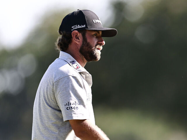 DORAL, FLORIDA - MAY 01: Cameron Young of the United States walks on the 12th green during the second round of the Cadillac Championship 2026 at Trump National Doral Miami on May 01, 2026 in Doral, Florida.