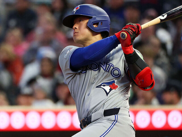MINNEAPOLIS, MINNESOTA - MAY 01: Kazuma Okamoto #7 of the Toronto Blue Jays hits a two run home run against the Minnesota Twins during the fifth inning at Target Field on May 1, 2026 in Minneapolis, Minnesota.